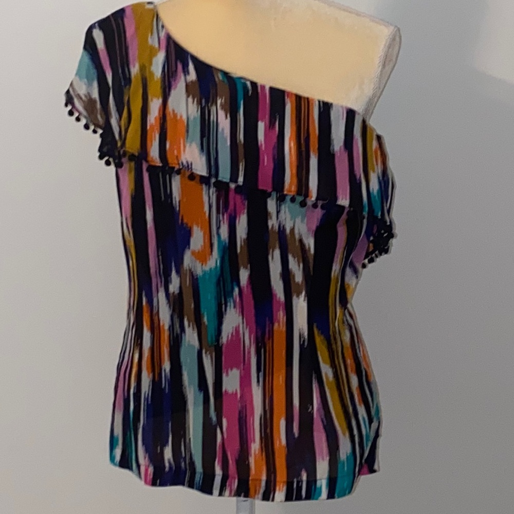 Trina Turk and INC collaboration one sleeve blouse